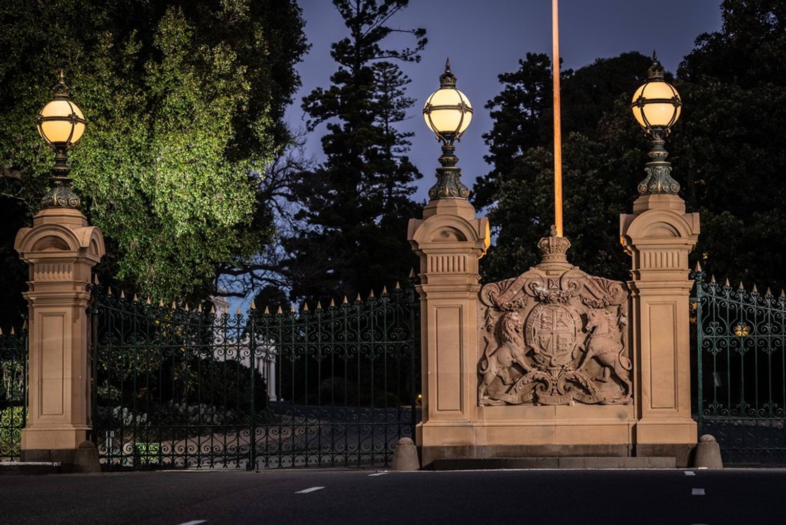The front gate at Government House Victoria at night