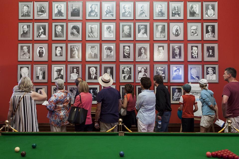 Visitors in the Billiard Room at Government House during an open day